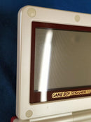 nintendo ags-001 handheld console side view