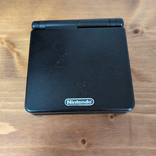 nintendo ags-001 handheld console front view