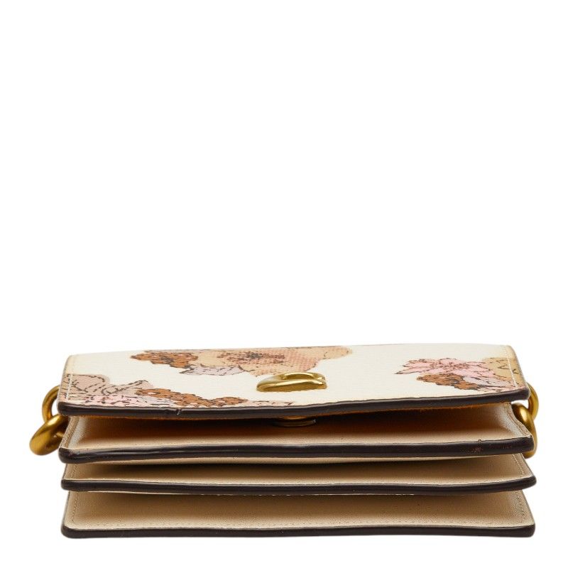 coach beige shoulder bag side view