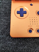 nintendo ags-001 orange handheld console rear view