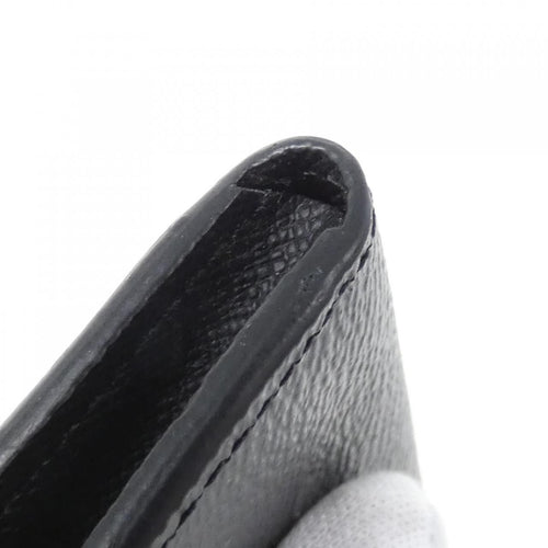louis vuitton m63536 black coin purse rear view