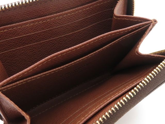 louis vuitton m60067 coin purse condition details
