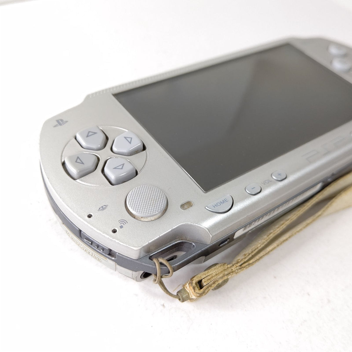 sony psp-1000 handheld console front view