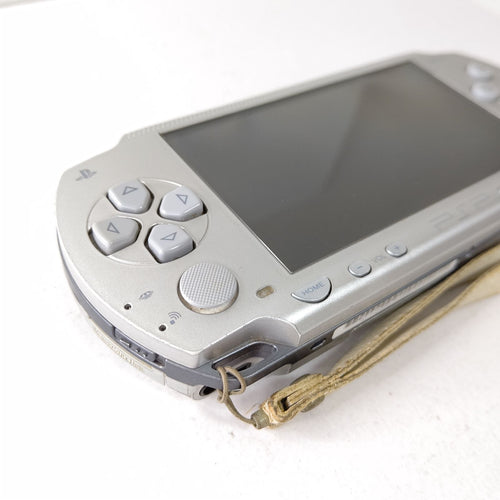 sony psp-1000 handheld console front view
