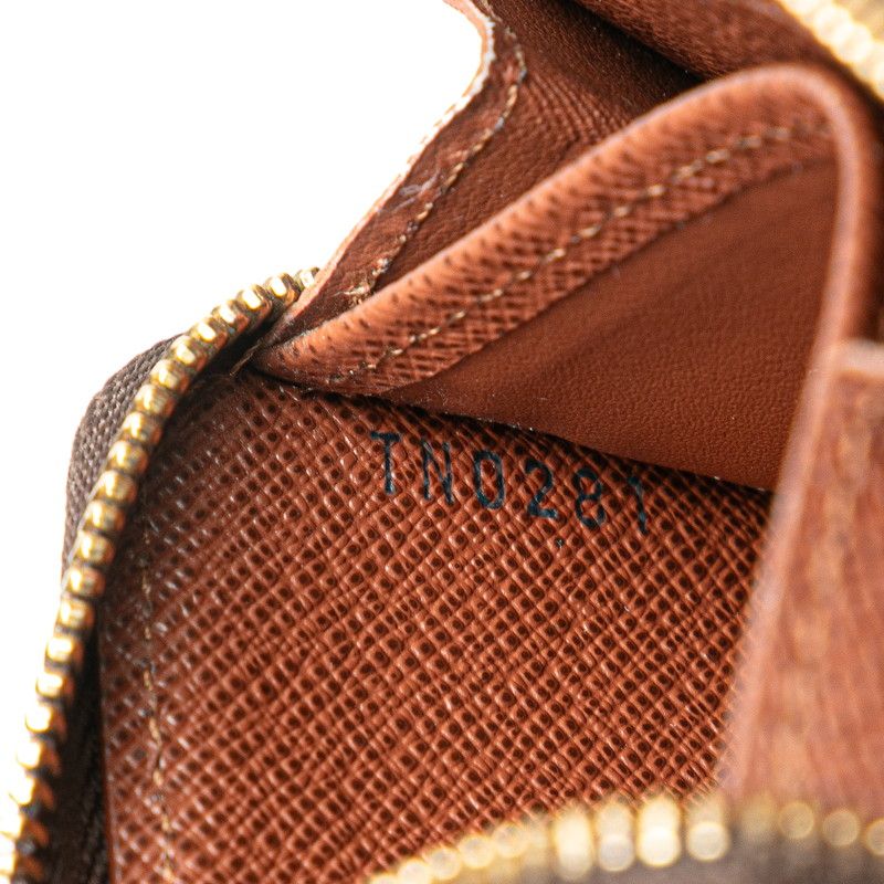 louis vuitton m60067 coin purse condition details