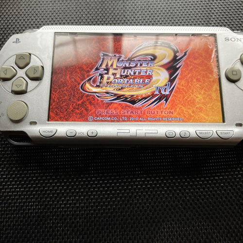 sony psp-1000 handheld console side view