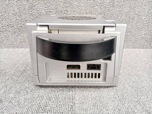 nintendo dol-001 video game console side view