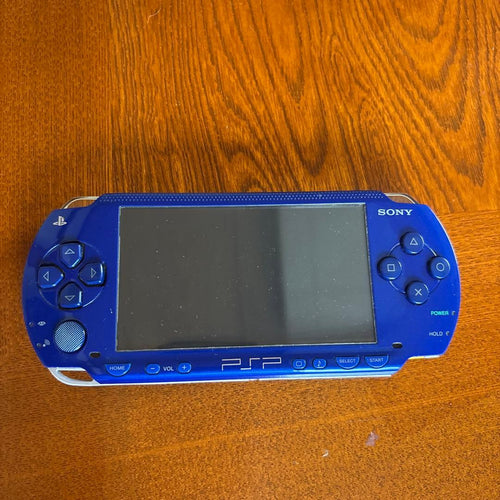 sony psp-1000 handheld console front view