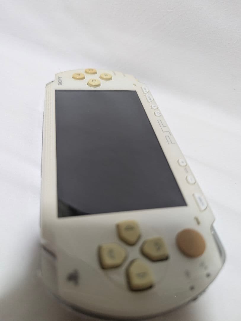 sony psp-1000 handheld console side view