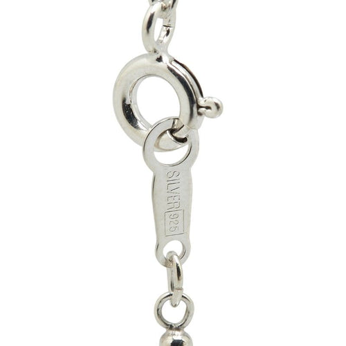 the kiss necklace side view