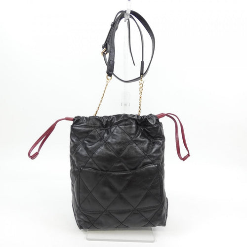 cococelux gold handbag rear view