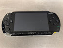 sony psp-1000 handheld console front view