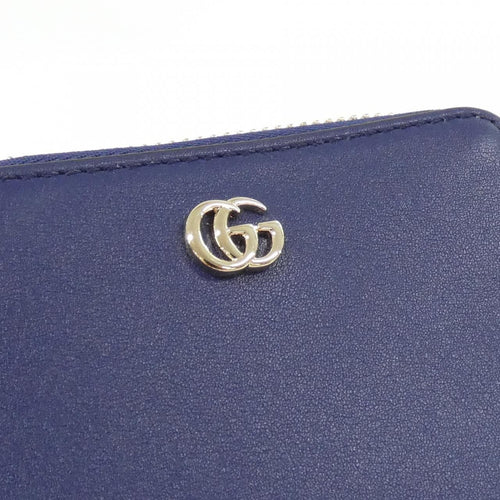 gucci navy coin purse side view