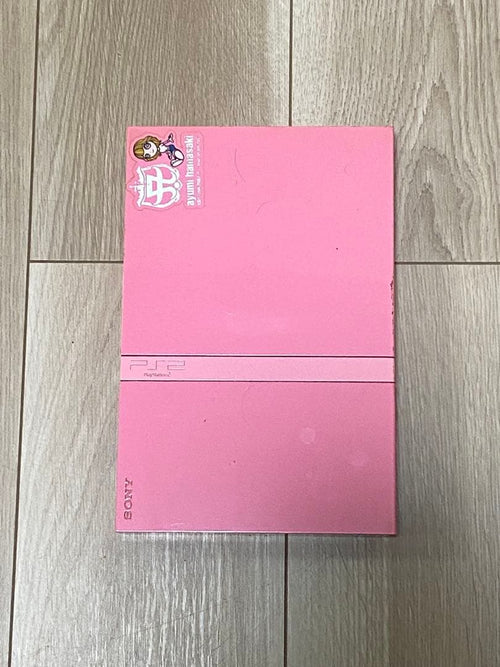 sony scph-77000 pink video game console front view