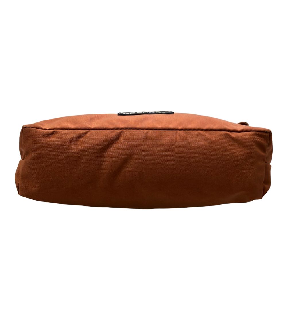 gregory orange shoulder bag side view