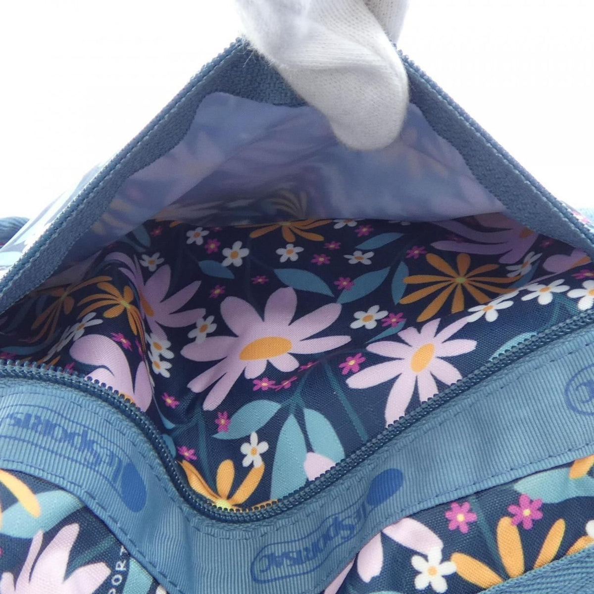 lesportsac orange / pink handbag functional details