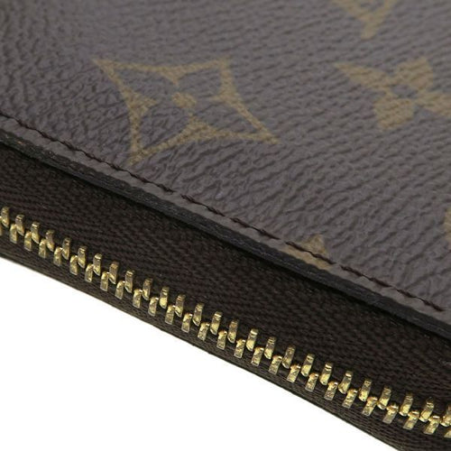 louis vuitton m60067 wallet side view