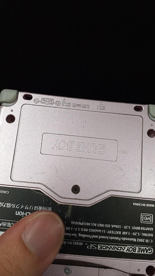 nintendo ags-001 handheld console rear view
