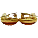 chanel pink earrings side view