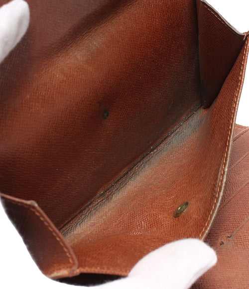 louis vuitton m61215 wallet condition details