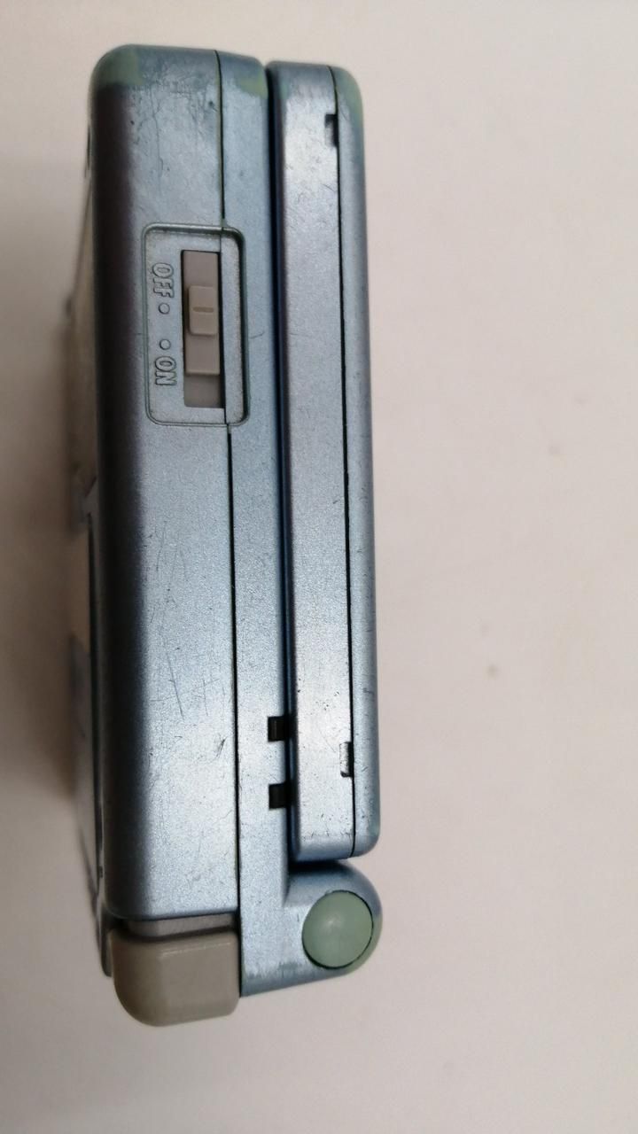 nintendo ags-001 handheld console condition details