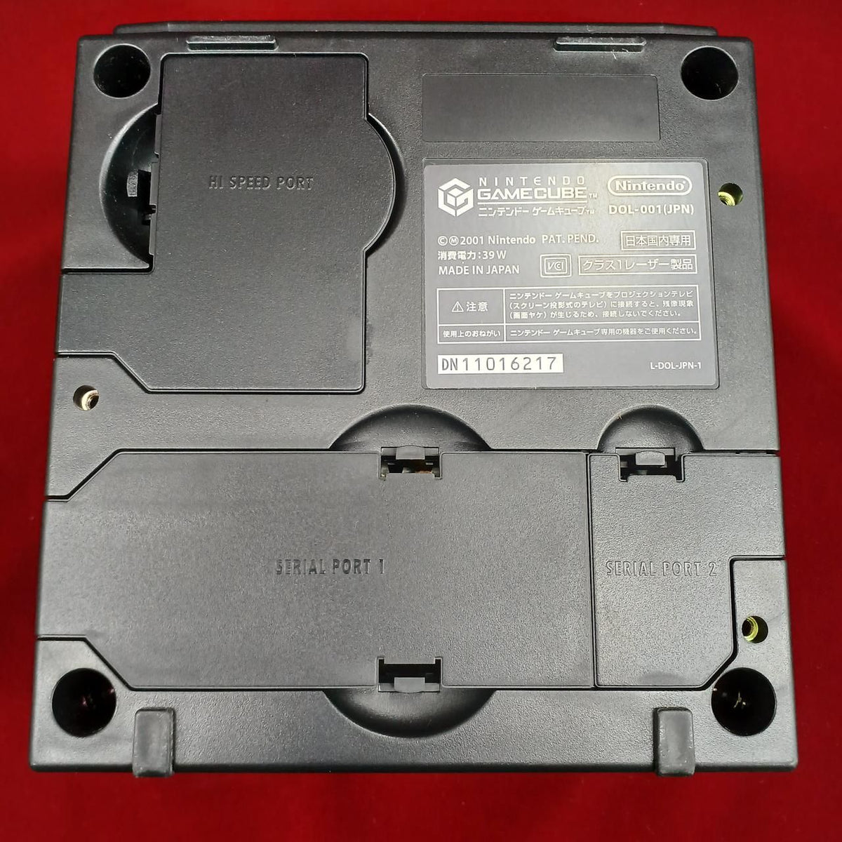 nintendo dol-001 video game console side view