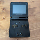 nintendo ags-001 handheld console side view