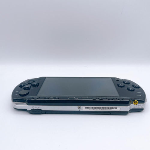 sony psp-2000 handheld console side view